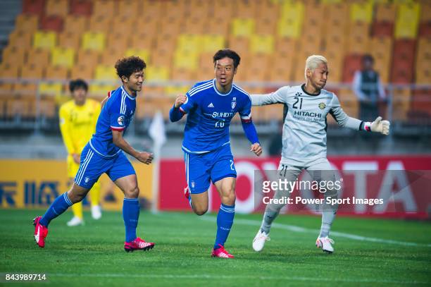 Suwon Samsung FC midfielder Yeom Ki Hun celebrates after scoring his goal during the 2015 AFC Champions League Round of 16 1st Leg match between...