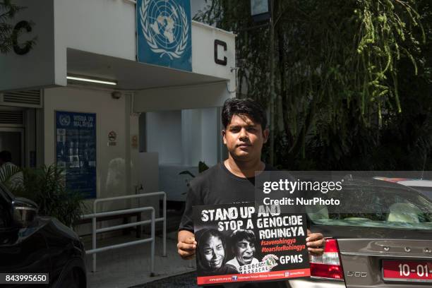 Ziaur Rahman a Myanmars Rohingya refugee hold a picket outside UN HQ in Kuala Lumpur, Malaysia, 09 September 2017.