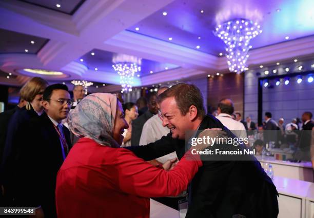 Newly elected International Paralympic Committee President Andrew Parsons is congratulated during the IPC General Assembly and Conference 2017 at Abu...