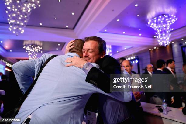 Newly elected International Paralympic Committee President Andrew Parsons is congratulated during the IPC General Assembly and Conference 2017 at Abu...