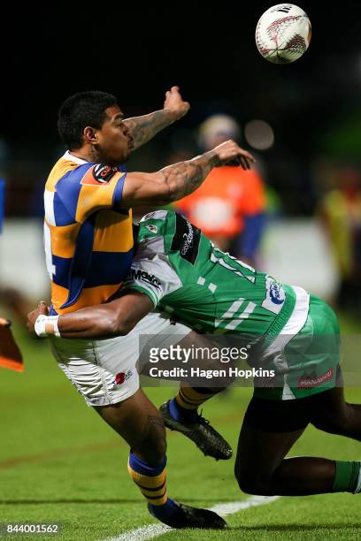 Monty Ioane of Bay of Plenty is tackled by Willy Ambaka of Manawatu during the round four Mitre 10 Cup match between Manawatu and Bay of Plenty at on...