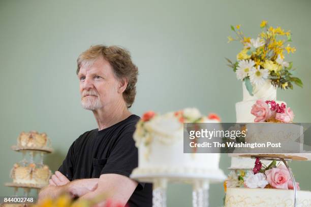 Jack Phillips stands for a portrait near a display of wedding cakes in his Masterpiece Cakeshop in Lakewood, CO on Thursday, September 1, 2016. Jack...