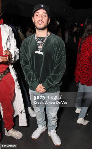Rapper Russ attends Kith Sport fashion show at Classic Car Club on September 7, 2017 in New York City.