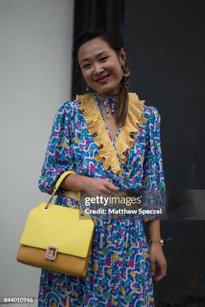 Mary Gui is seen attending Tadashi Shoji during New York Fashion Week wearing wearing Michal Golan, Wayard Collection, Rumbatime on September 7, 2017...