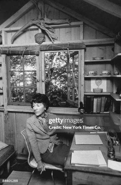 American writer, and wife of aviator Charles Lindbergh, Anne Morrow Lindbergh in her study at home, Tokeneke Estates, Darien, Connecticut, 10th...