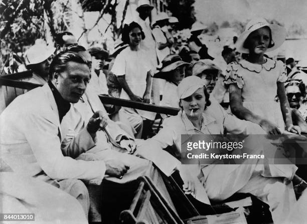Marlène Dietrich assistant à une partie de polo en compagnie de son époux, Rudolf Sieber et de sa fille Maria, à Los Angeles, CA.