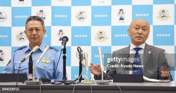 Fukuoka prefectural police hold a press conference in Kitakyushu, southwestern Japan, on Sept. 8 announcing the arrest of several members of...