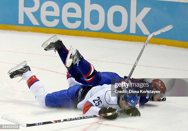 Denis Khlystov of Metallurg Magnitogorsk challenges Radoslav Suchy of ZSC Lions Zurich during the IIHF Champions Hockey League final game between...