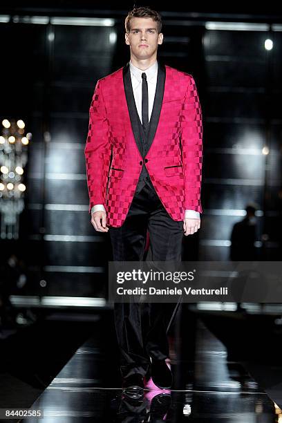 Model walks the runway during the Dolce & Gabbana show as part of Milan Fashion Week Autumn/Winter 2009/10 Menswear on January 17, 2009 in Milan,...