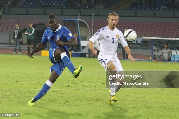 Mario Balotelli with Haroyan during a soccer match, at the San Paolo stadium, between Italia and Armenia.