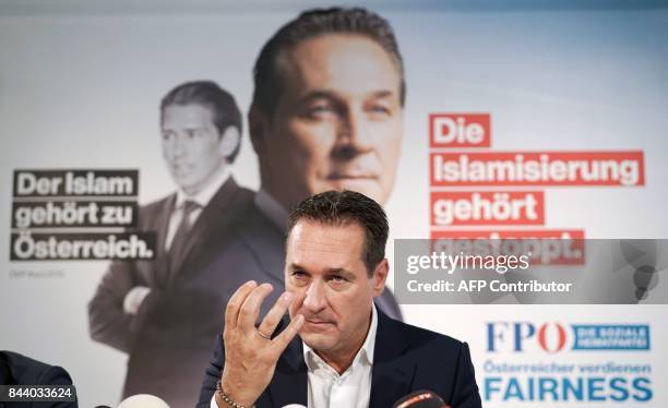 Chairman of the Freedom Party of Austria Heinz-Christian Strache attends a press conference to present the party's new election posters reading...