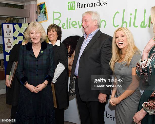 Camilla, Duchess of Cornwall poses with Lynda Bellingham, Christopher Biggins and Melissa Messenger during a tour of the Barnardo�s village,...