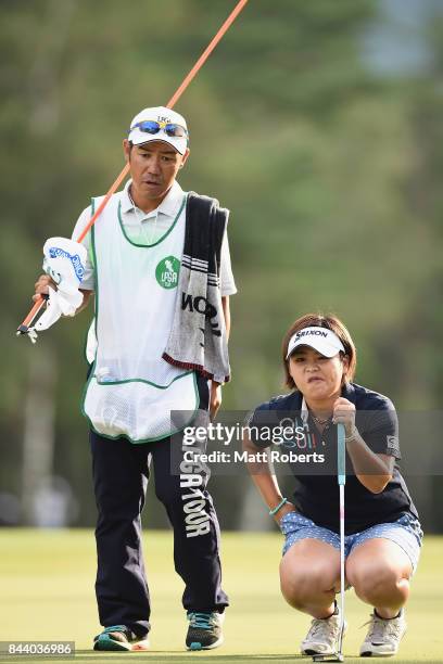 Hiroko Azuma of Japan prepares to putt on the 18th green during the second round of the 50th LPGA Championship Konica Minolta Cup 2017 at the Appi...