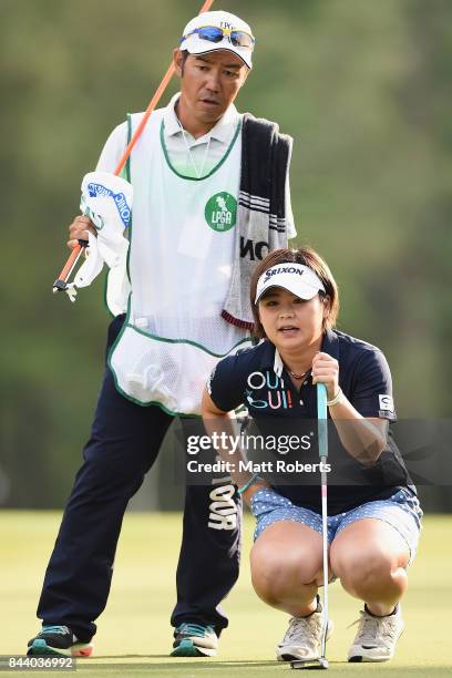 Hiroko Azuma of Japan prepares to putt on the 18th green during the second round of the 50th LPGA Championship Konica Minolta Cup 2017 at the Appi...