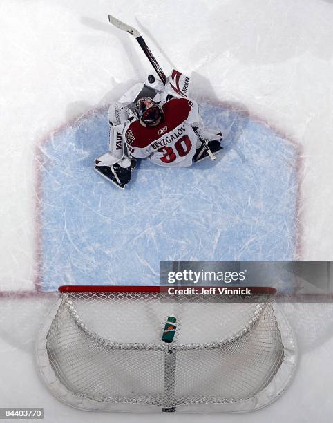 Ilya Bryzgalov of the Phoenix Coyotes makes a save during the game against the Vancouver Canucks at General Motors Place on January 15, 2009 in...