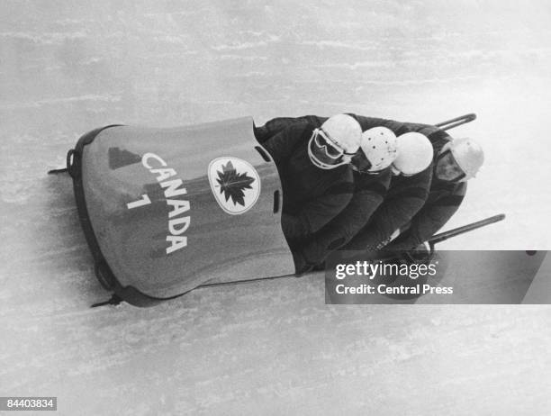 The Canadian team competing in the final run of the four-man bobsleigh event at the 1964 Winter Olympics in Innsbruck, Austria, 7th February 1964....