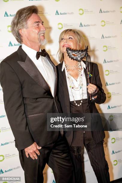 John Easterling and Olivia Newton John attends the Olivia Newton-John Gala Red Carpet at Crown Palladium on September 8, 2017 in Melbourne, Australia.