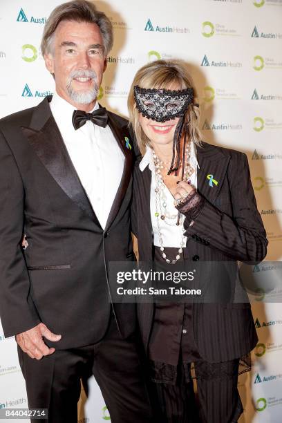 John Easterling and Olivia Newton John attends the Olivia Newton-John Gala Red Carpet at Crown Palladium on September 8, 2017 in Melbourne, Australia.