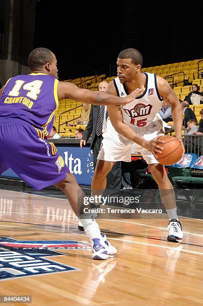 Trey Johnson of the Bakersfield Jam drives the ball against Joe Crawford of the Los Angeles D-Fenders during day 1 of the D-League Showcase at McKay...