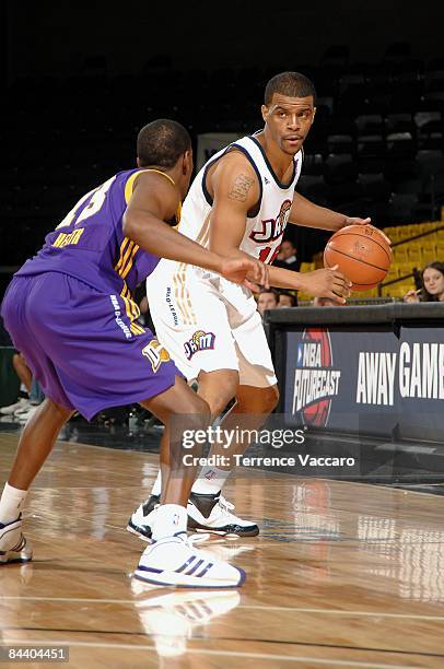 Trey Johnson of the Bakersfield Jam drives the ball against Brandon Heath of the Los Angeles D-Fenders during day 1 of the D-League Showcase at McKay...