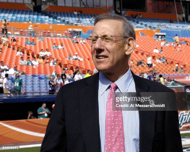 New owner Stephen Ross watches warmups as the Miami Dolphins host the Baltimore Ravens in an NFL Wildcard Playoff Game at Dolphins Stadium on January...