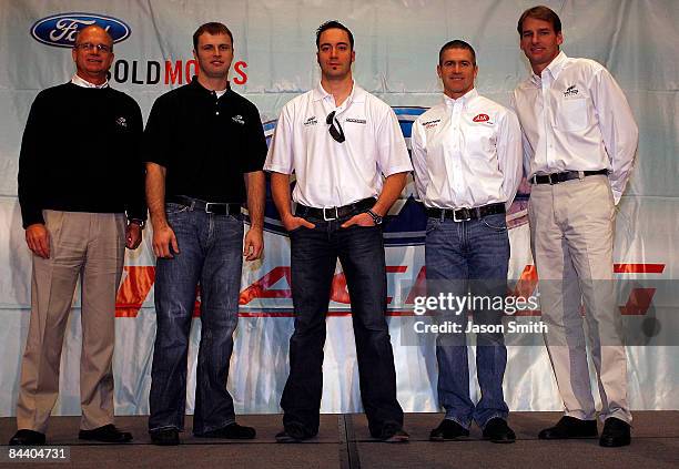 Yates Racing owner Max Jones, driver Travis Kvapil, Paul Menard, Bobby Labonte, and owner Doug Yates pose during the NASCAR Sprint Media Tour hosted...