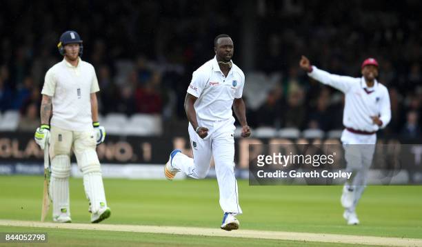 Kemar Roach of the West Indies celebrates dismissing Dawid Malan of England during day two of the 3rd Investec Test match between England and the...