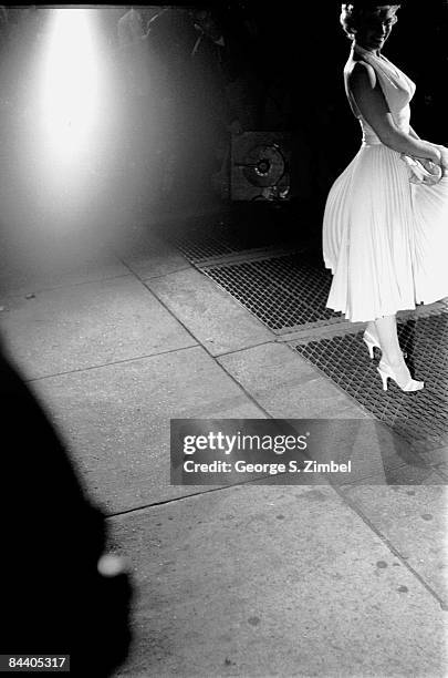 American film actress and sex symbol Marilyn Monroe on location during the filming of 'The Seven Year Itch' , New York, New York, September 14th and...