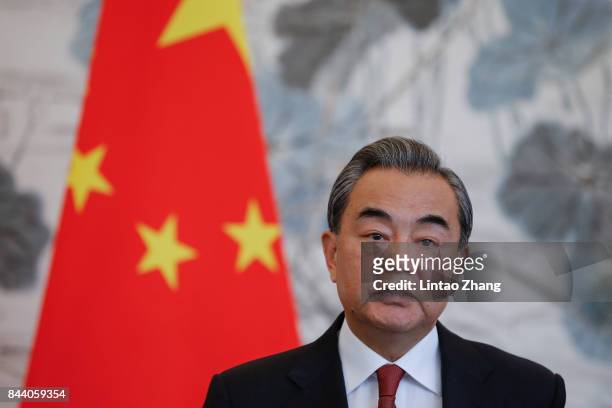 Chinese Foreign Minister Wang Yi speaks during a press conference with Pakistan Foreign Minister Khawaja Muhammad Asif at Diaoyutai State Guesthouse...