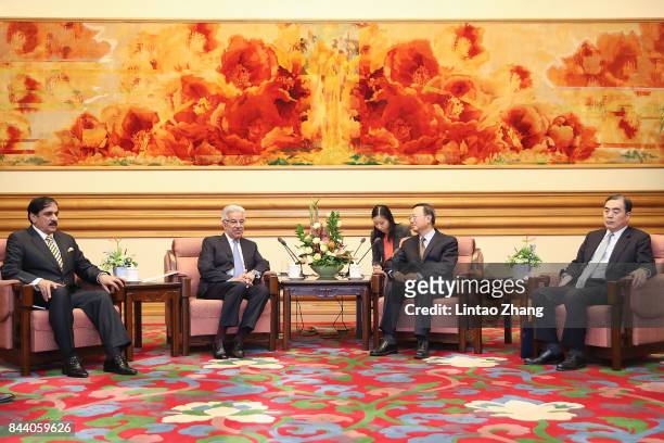 Pakistan Foreign Minister Khawaja Muhammad Asif attends a meeting with Chinese State Councilor Yang Jiechi at Zhongnanhai Leadership Compound on...