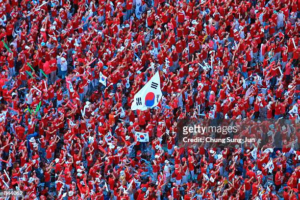 Tens of thousands of South Korean soccer fans gather to watch a telecast of the World Cup semi-final match between South Korea and Germany June 25,...