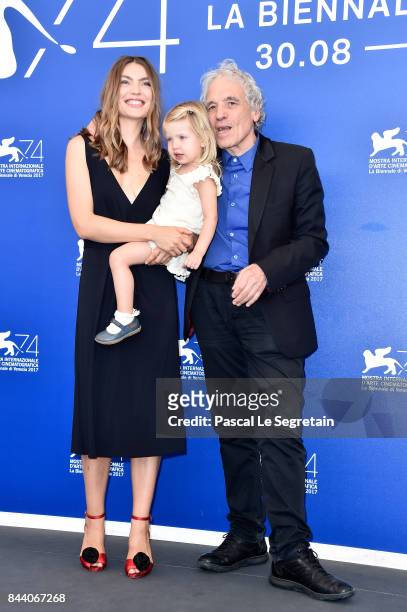 Christina Chiriac Ferrara, Anna Ferrara and Abel Ferrara attend the 'Piazza Vittorio' photocall during the 74th Venice Film Festival at Sala Casino...