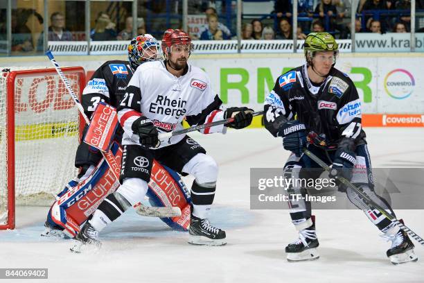 Sebastian Dahm of Iserlohn , Nico Krämmer of Koeln , Alexander Bonsaksen of Iserlohn battle for the ball during a friendly match between Iserlohn...