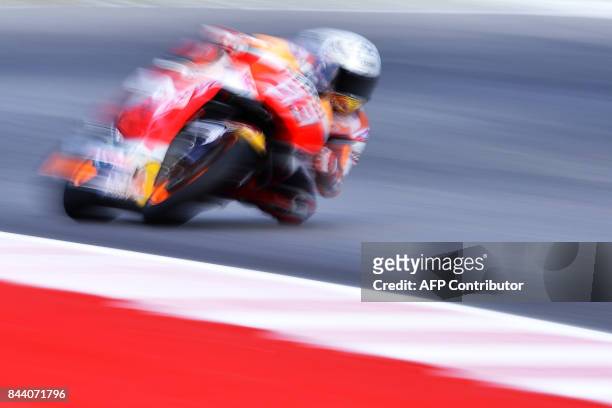 Repsol Honda Team's Marc Marquez from Spain practices at the Marco Simoncelli Circuit in Misano on September 8 ahead of the San Marino Moto Grand...