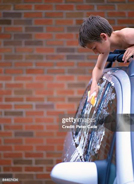 boy washing car - pocket money stock pictures, royalty-free photos & images