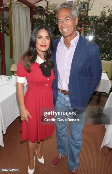 Salma Hayek and Dr Mitch Besser, founder of mothers2mothers, attend the mothers2mothers Host Committee Breakfast at Mark's Club on September 7, 2017...