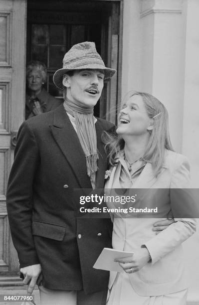 Irish actress Sinead Cusack with English actor Jeremy Irons on their wedding day, 28th March 1978.