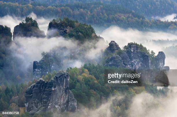 scenic view over bastei hiking area in saechsische schweiz with sandstone crags and pillars, taken in late october, saxon switzerland national park, saxony, germany, europe. - 砂岩 ストックフォトと画像