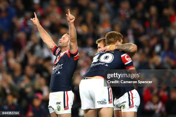 Boyd Cordner of the Roosters and team mates celebrate winning the NRL Qualifying Final match between the Sydney Roosters and the Brisbane Broncos at...