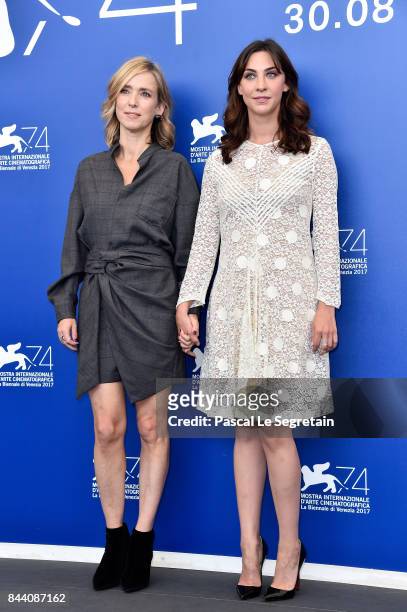 Lea Drucker and Mathilde Auneveux walk the red carpet ahead of the 'Jusqu'a La Garde' screening during the 74th Venice Film Festival at Sala Grande...