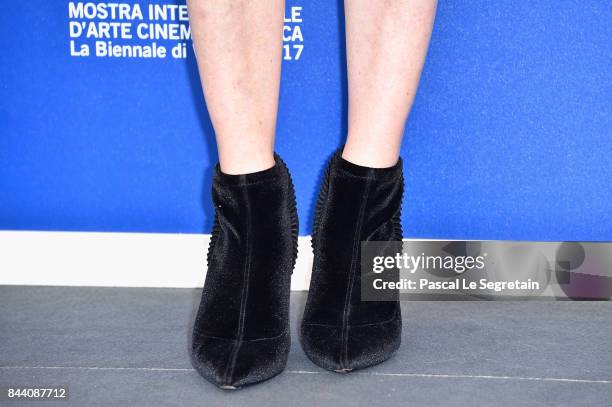 Lea Drucker, shoes detasils, walks the red carpet ahead of the 'Jusqu'a La Garde' screening during the 74th Venice Film Festival at Sala Grande on...