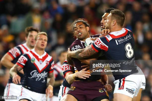 Adam Blair of the Broncos is tackled during the NRL Qualifying Final match between the Sydney Roosters and the Brisbane Broncos at Allianz Stadium on...