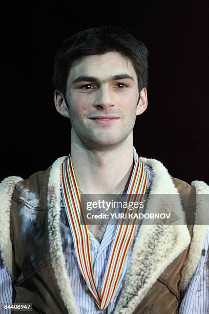 Italy's Samuel Contesti celebrates on the podium of the men program at the Hartwall Areena in Helsinki, on January 22 during the European Figure...