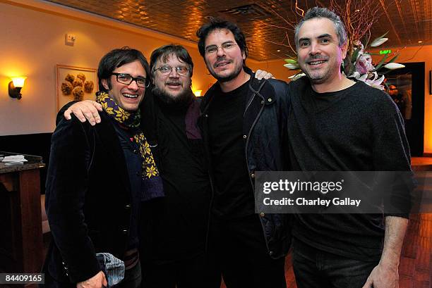 Actor Gael Garcia Bernal, producer Guillermo del Toro, director Carlos Cuaron and producer Alfonso Cuaron at the Bon Appetit Supper Club "Passing...