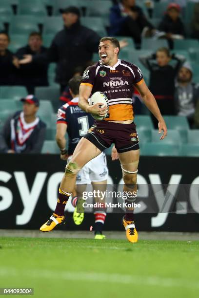 Corey Oates of the Broncos celebrates scoring a try during the NRL Qualifying Final match between the Sydney Roosters and the Brisbane Broncos at...