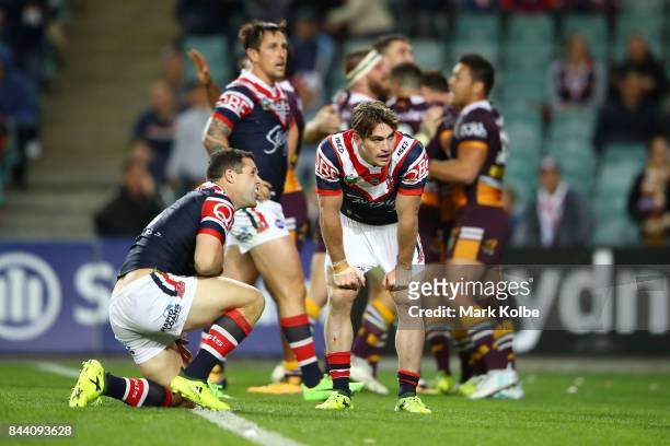 Michael Gordon and Connor Watson of the Roosters looks dejected after a Broncos try during the NRL Qualifying Final match between the Sydney Roosters...