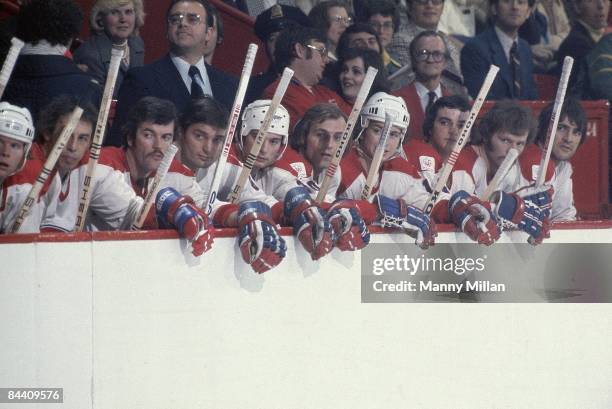 Montreal Canadiens coach Scotty Bowman on bench with Guy Lafleur and team during game vs New York Rangers. Montreal, Canada 2/20/1976 CREDIT: Manny...