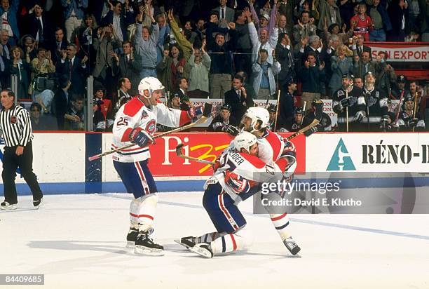 Montreal Canadiens Eric Desjardins and Mathieu Schneider victorious after goal vs Los Angeles Kings. Game 2. Montreal, Canada 6/3/1993 CREDIT: David...