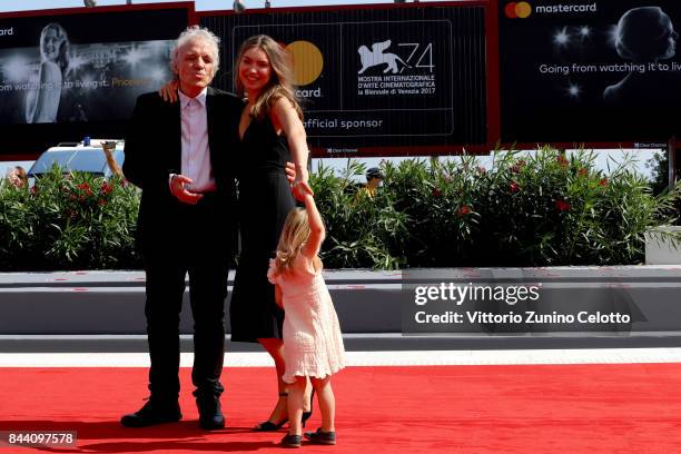 Abel Ferrara, Christina Chiriac Ferrara and Anna Ferrara walk the red carpet ahead of the 'Il Signor Rotpeter' and 'Piazza Vittorio' screening during...