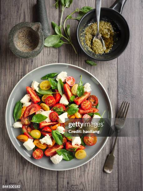 healthy tomatoes salad - basil stock pictures, royalty-free photos & images